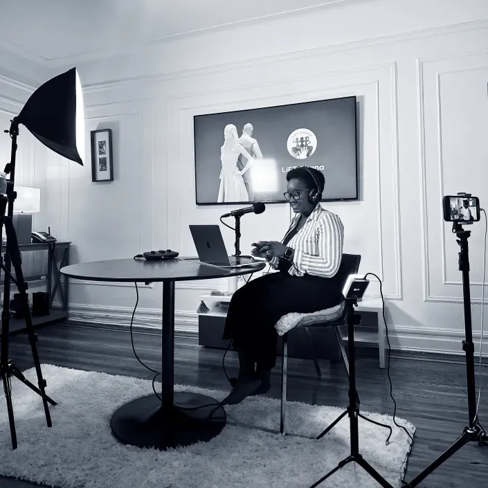 Grace recording the Lift Women Podcast